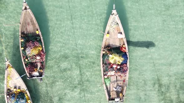 Tanzania Vertical Video  Boat Boats in the Ocean Near the Coast of Zanzibar Aerial View