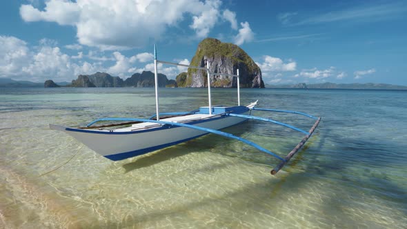 Tourist Banca Boat Float in Morning Light Ready for Island Hopping Trip. Nature Scene of El Nido