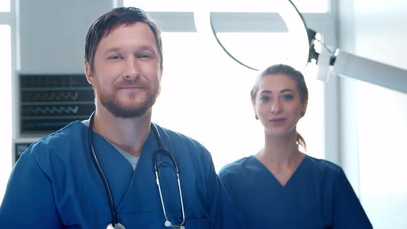 Professional medical doctors working in emergency medicine. Portrait of surgeon and the nurse.