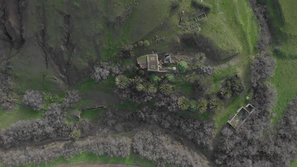 Top-down lowering view over old house in Serra de Dentro at Porto Santo island. Portugal