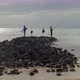 Two men fishing on the coast - VideoHive Item for Sale