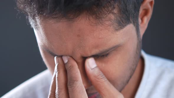 Upset Man Suffering From Strong Eye Pain