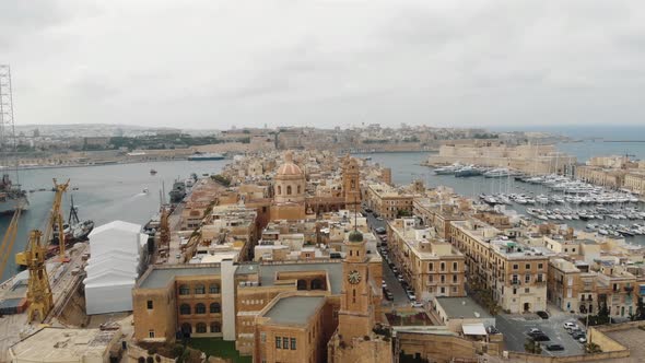 Aerial Push In Shot Over Senglea City In Malta