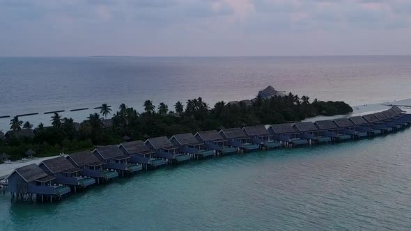 Aerial nature of marine bay beach by blue lagoon with sand background