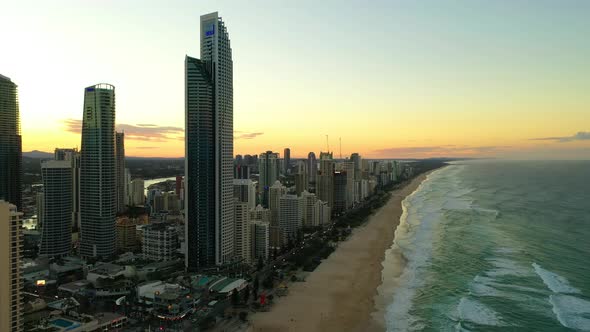 Pan shot, Sunset Surfers Paradise, Golden Skies, High rise Apartment towers