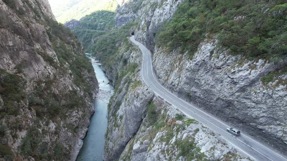 Aerial view of Tara river canyon, big mountains and road Montenegro, Europe