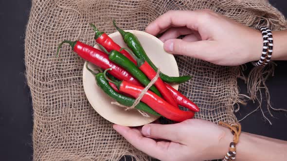 Red Green Chili Peppers View From the Top with Spices. the View From the Top. Flat Lay. Vertical