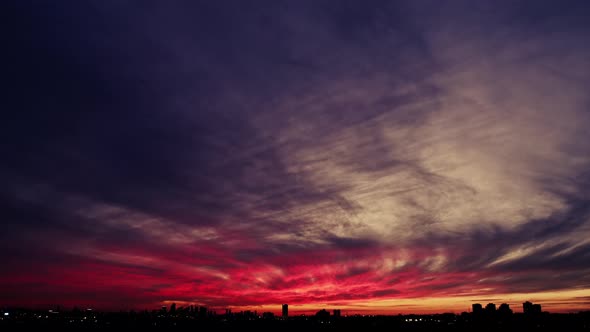 Golden sunset, red sky cityscape