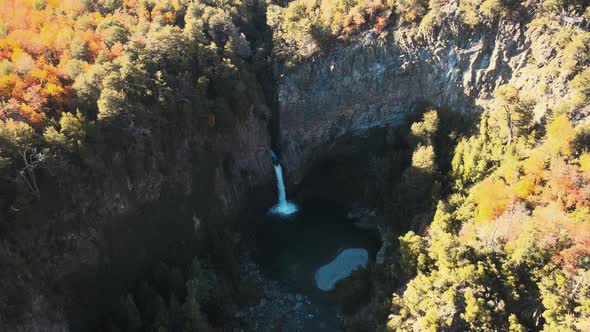 Aerial view of a small waterfall in a national park sites in Chile at daytime