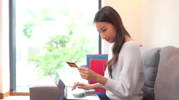 Young asian woman shopping