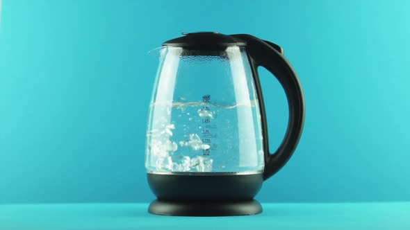 An Electric Kettle with Transparent Walls. Active Boiling. Concept