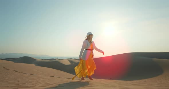 Slow Motion  Beautiful Model Dancing and Walking By Sand Dunes,  Slow Motion