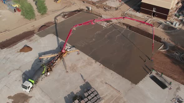 Aerial View  Road Construction Site and a Big Pump for Concrete Pouring Road