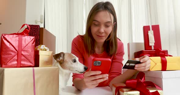 Lady Buying Online with Credit Card and Smartphone Home Pet
