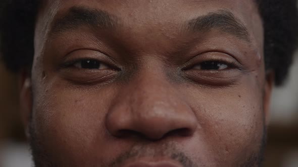 Surprised African American Man Eyes with His Eyebrows Up