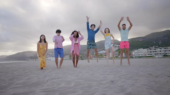 Group of friends having fun on the beach.