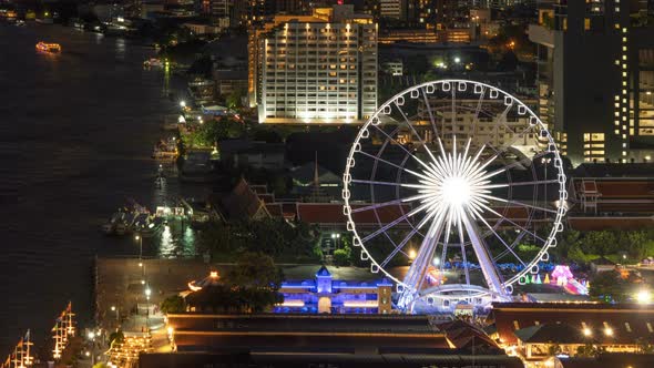 Time lapse of aerial view of the ferris wheel, Asiatique The Riverfront in Bangkok, Thailand.