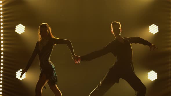 Elements of Classical Ballroom Latin American Dance Performed By Pair of Professional Dancers