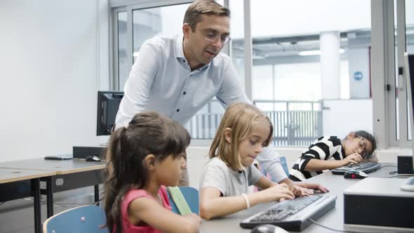 Multiethnic Girls Doing Task on Computer Science Together