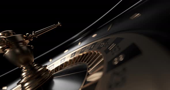 Animated Modern Black And Golden Roulette Wheel On Black Background. 3D 4K Video.