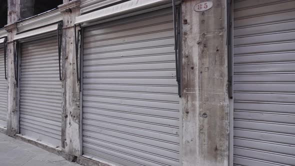 a Line of Grey Color Garages 