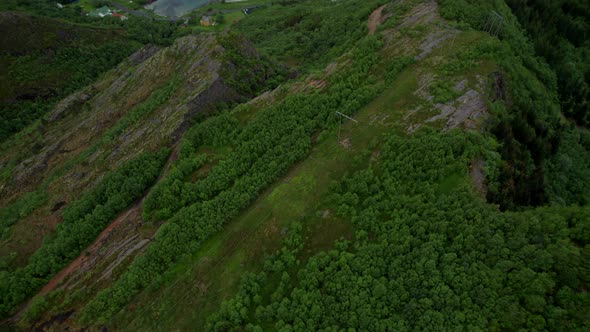 Aerial revealing shot of a dramatic landscape in Northern Norway, Helgeland, Nordland