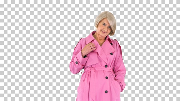 Beautiful senior lady in pink autumn outfit, Alpha Channel