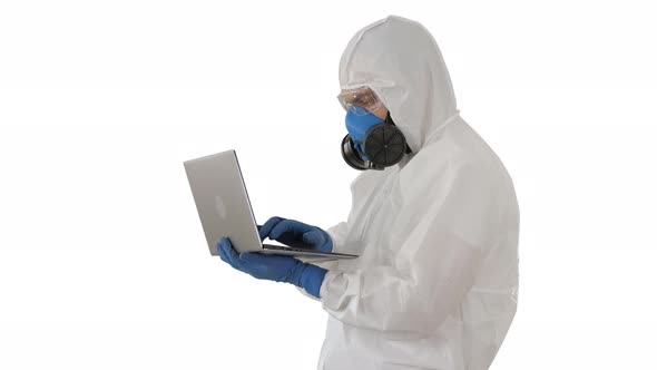 Medical Doctor in White Protective Uniform Using Laptop on White Background