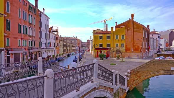 Venice City Street with Sidewalks and Bridge Over Canal