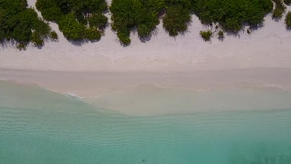 Aerial view panorama of lagoon beach by blue water with sand background