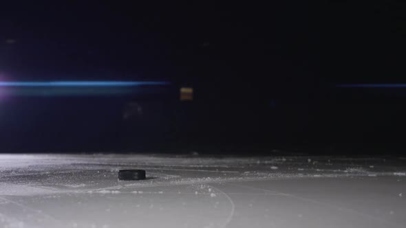 Ice Hockey Player Make Ice Sparkles on High Speed Braking