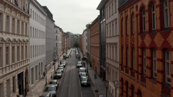 Forwards Reveal of Street in Urban Neighbourhood with Multistorey Buildings