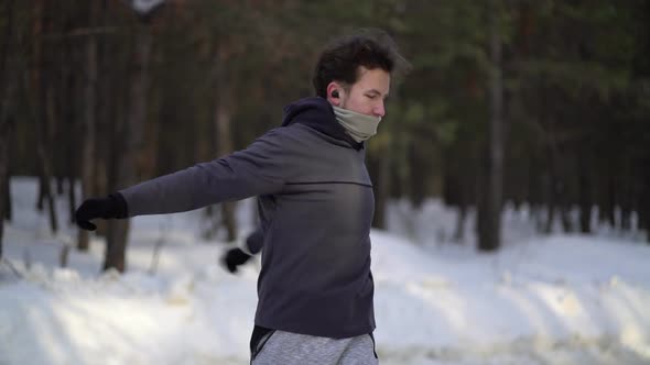 Boy in the Sportswear Doing Exercises Outdoors in Pine Forest. Healthy Lifestyle Sport Concept