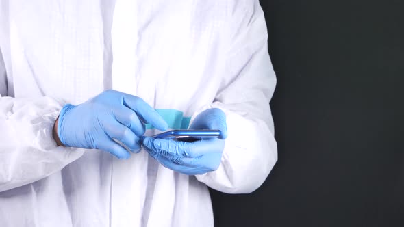 Doctor's Hand Protective Gloves Using Smartphone