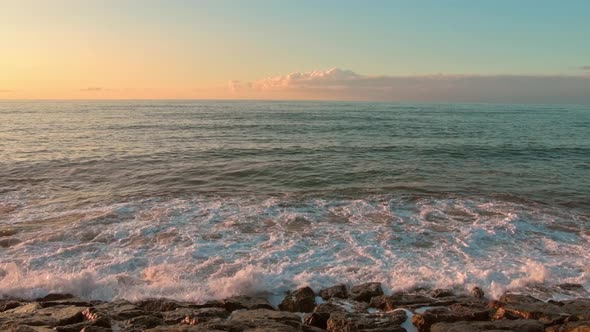 Crashing Waves On Rocks Background