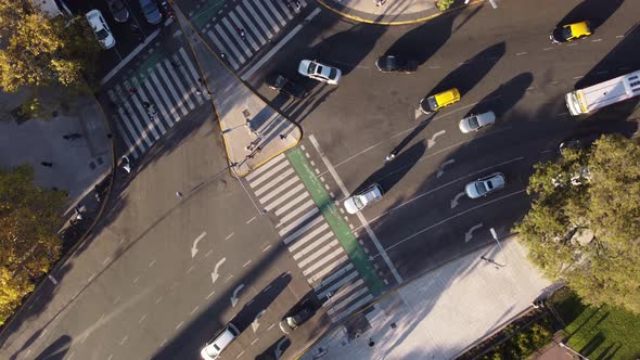 beautiful circular aerial views looking down  on a busy round traffic intersection in buenos aires a