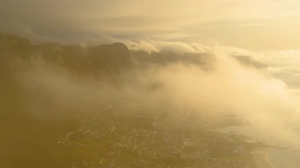 TimeLapse - Misting in from ocean, low-hanging clouds over Twelve Apostles, shot from Lion's Head, C