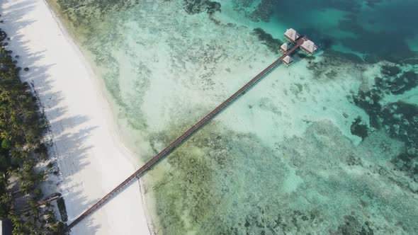 Aerial View of a House on Stilts in the Ocean on the Coast of Zanzibar Tanzania Slow Motion