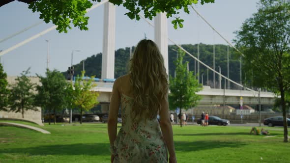 Woman walking towards Elisabeth Bridge