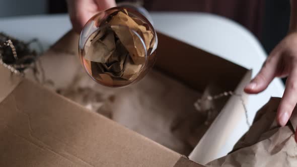 Woman at Home Opening Carton Box Just Delivered Parcel on Address