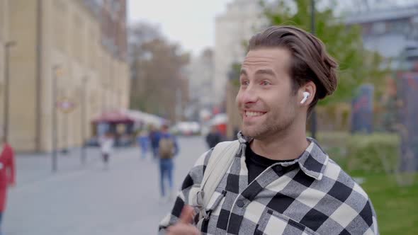 Happy man talking on the phone.