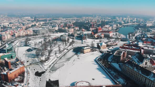 Drone Footage of Snowcovered Streets in the City of Wroclaw Poland
