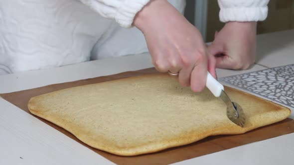 Freshly Baked Biscuit On The Table. Steam Comes From It. Cooking Biscuit Cake Dairy Girl. Close Up