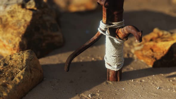 Old Abandoned Hand Water Pump in Desert