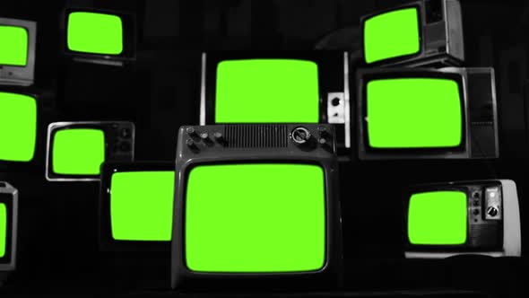 Vintage TVs turning on Green Screens. Black and White Tone.