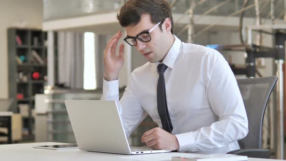 Headache Businessman with Pain in Head Working In Office