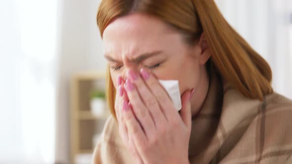 Sick Woman in Blanket Coughing at Home