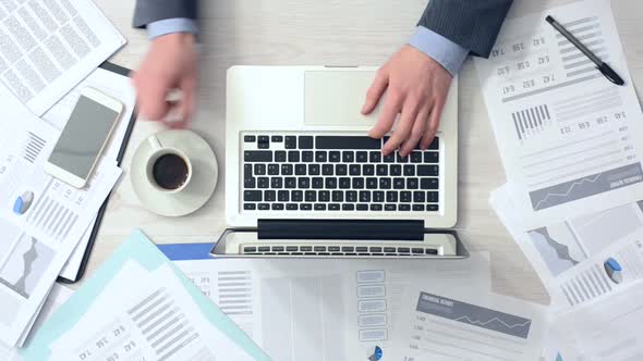 Businessman working at office desk