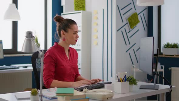 Portrait of Company Employee Working on Research Statistics