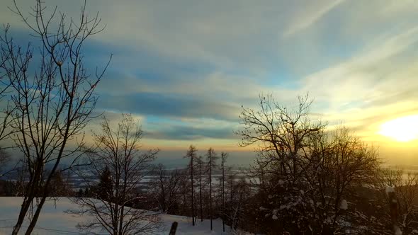 Driving in a Car and Observing Winter Sunset